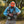 Man in outdoor setting with fishing gear and orange cap