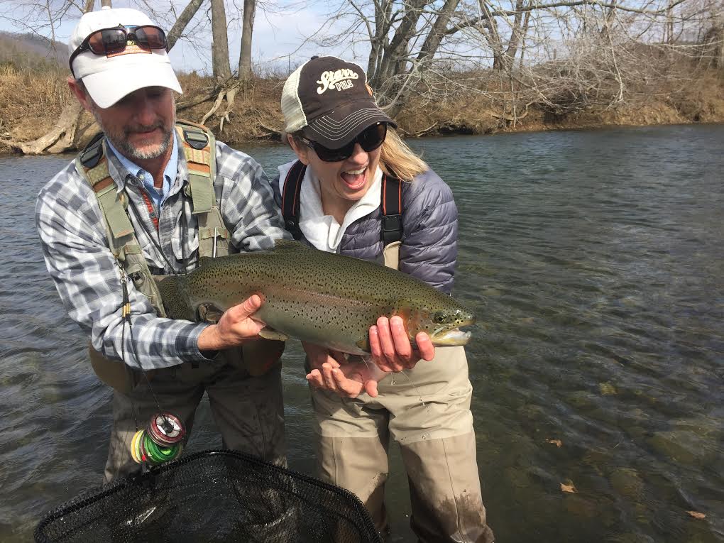 Va trout guides and guest with a nice Rainbow trout caught in Bath county, Virginia.