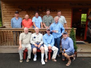 Group of anglers in front of the South Holston River Lodge.