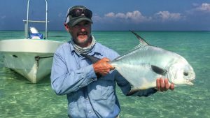 angler with permit cuaght at Belize River Lodge. Belize. Long Caye outpost.