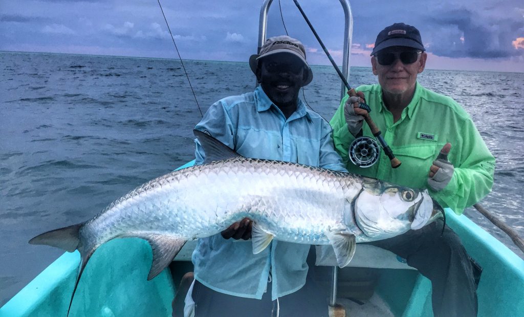 Angler and guide with tarpon caught while fishing Belize River Lodge. November 11, 2017