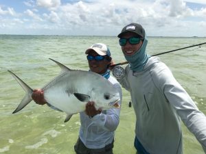 Virginia angler with a great permit caught in Ascension Bay, Mexico while fishing with a Virginia fishing guide.