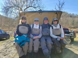Four female fly fishers taking a break from the ladies fly fishing class on Big Bend Farm. Learing how tho fly fish with Virginia fishing guides.