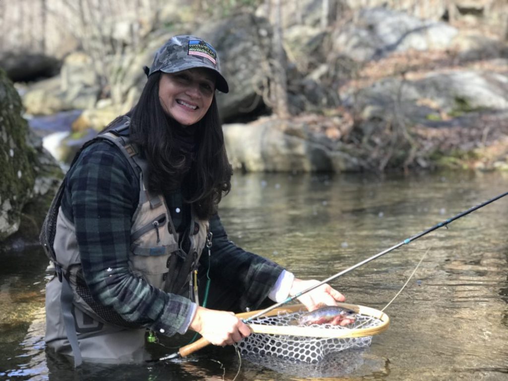 Female fly fishing in the Shenandoah National Park, Virginia with fishing guide from the Albemarle Angler.
