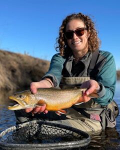 Female angler with a great brook trout caught on South River Preserve on the South River. One of Sachem's Pass club waters.